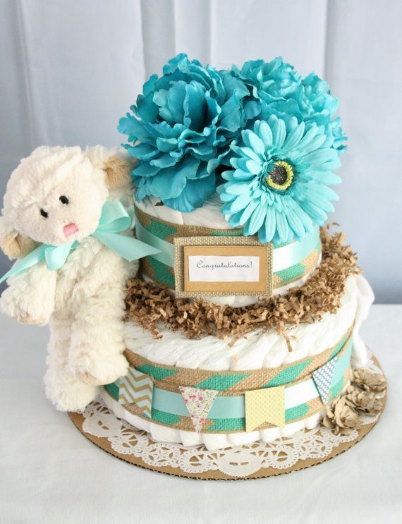 Foto: Reprodução / <a href="https://www.etsy.com/listing/206042422/turquoise-and-burlap-diaper-cake" target="_blank">Etsy</a>