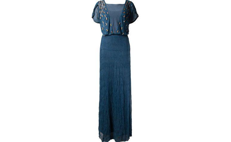 Vestido Emanuelle Junqueira por R$5.930 na <a href="http://ad.zanox.com/ppc/?27713776C71065639&ULP=[[http://www.farfetch.com/br/shopping/women/emannuelle-junqueira-vestido-longo-de-tule-item-10973181.aspx?utm_source=zanox&utm_medium=custom_deeplink&utm_term=geral&utm_content=custom_deeplink&utm_campaign=custom_deeplink]]" target="blank_">Farfetch</a>