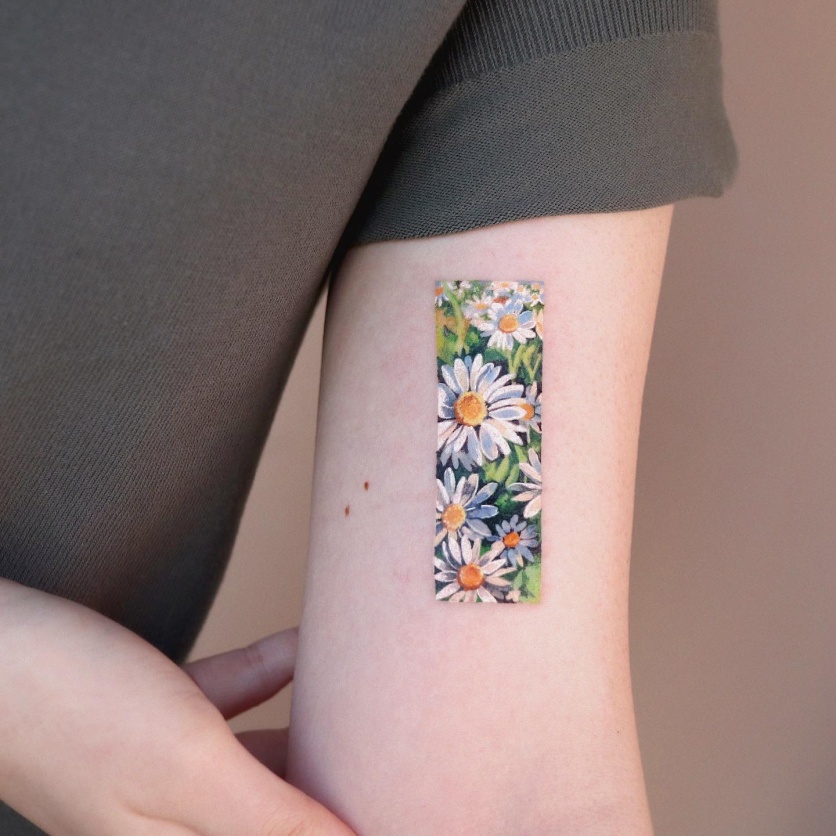 tatuagem de flores delicadas